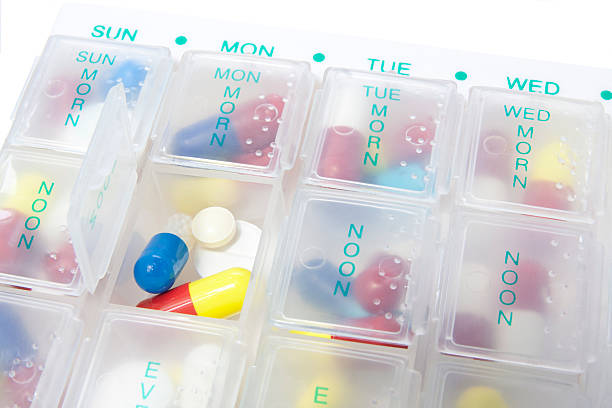 Pill planner stock photo