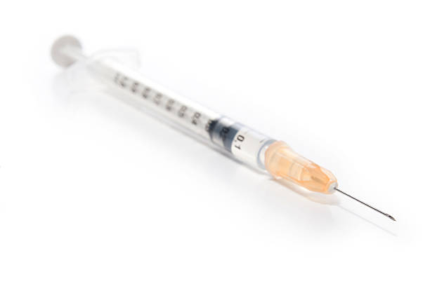Hypodermic syringe and needle stock photo