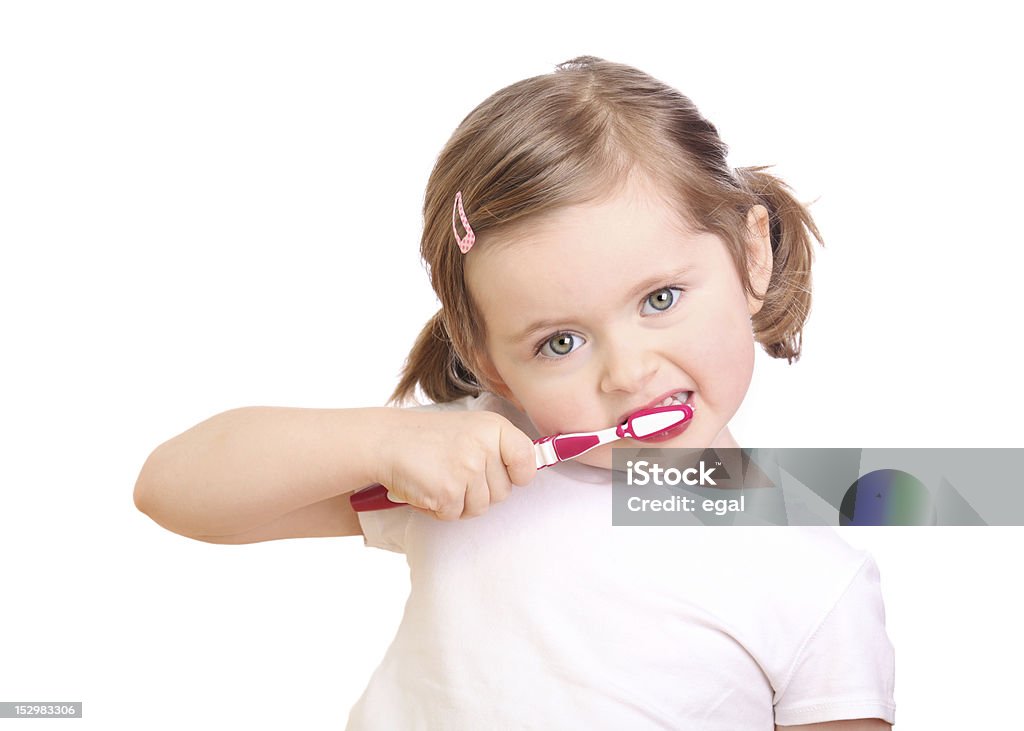 Menina escovar os dentes - Foto de stock de Braço humano royalty-free