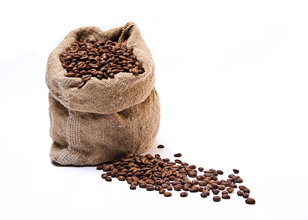 istock Full coffee beans sack with some scattered 152983568