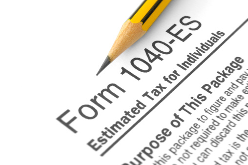 Close-up form 140-ES (Estimated Tax for Individuals) with pencil on it