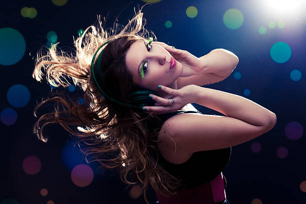 Young woman with flying hair stock photo