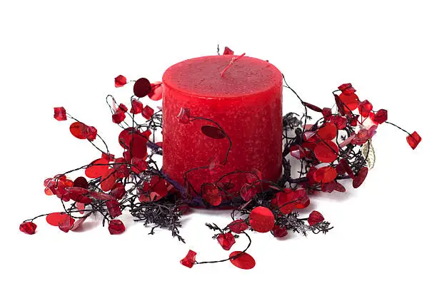 Red candle as home decoration, isolated on white background