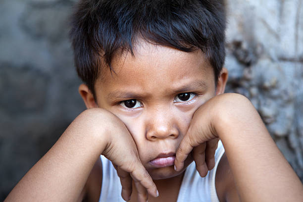 istock Young Filipino boy - poverty 152986778