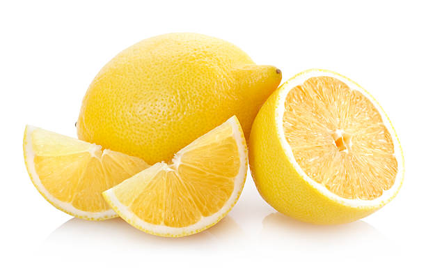 istock Cut up and whole lemons isolated on white 152987784