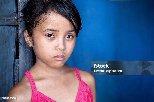 Young Asian Girl Over Blue Stock Photo - Download Image Now - Philippines, Child, Filipino Ethnicity