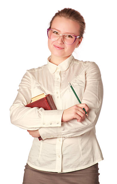istock smiling teacher with book and pen 152988588