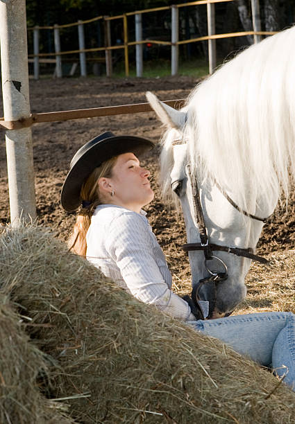 istock Young woman with her horse 152988770