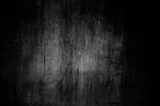 Dark concrete wall texture for grunge backgrounds.