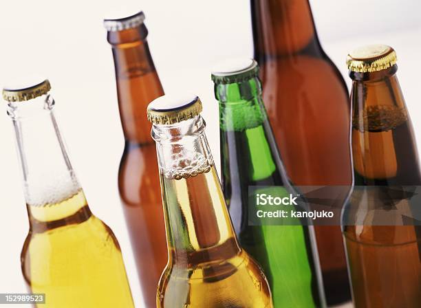 Assorted Beer Bottles Stock Photo - Download Image Now - Abstract, Alcohol - Drink, Blue