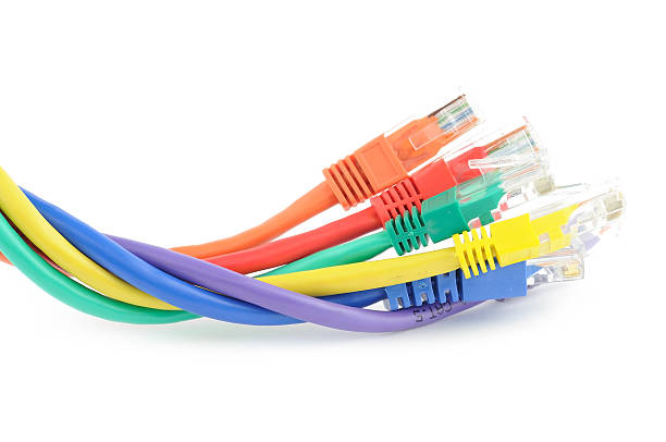 istock Various colors of computer cables, bundled together  152989998