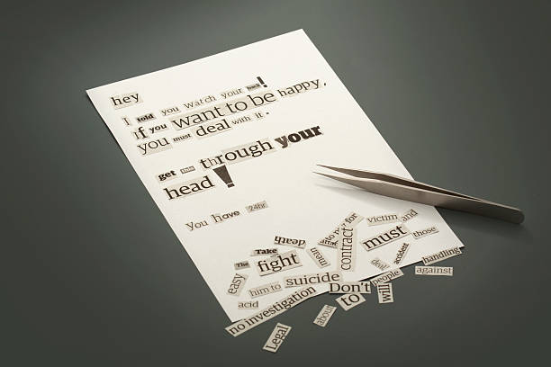 Anonymous letter Concept of anonymous letter on gray background anonymous letter stock pictures, royalty-free photos & images