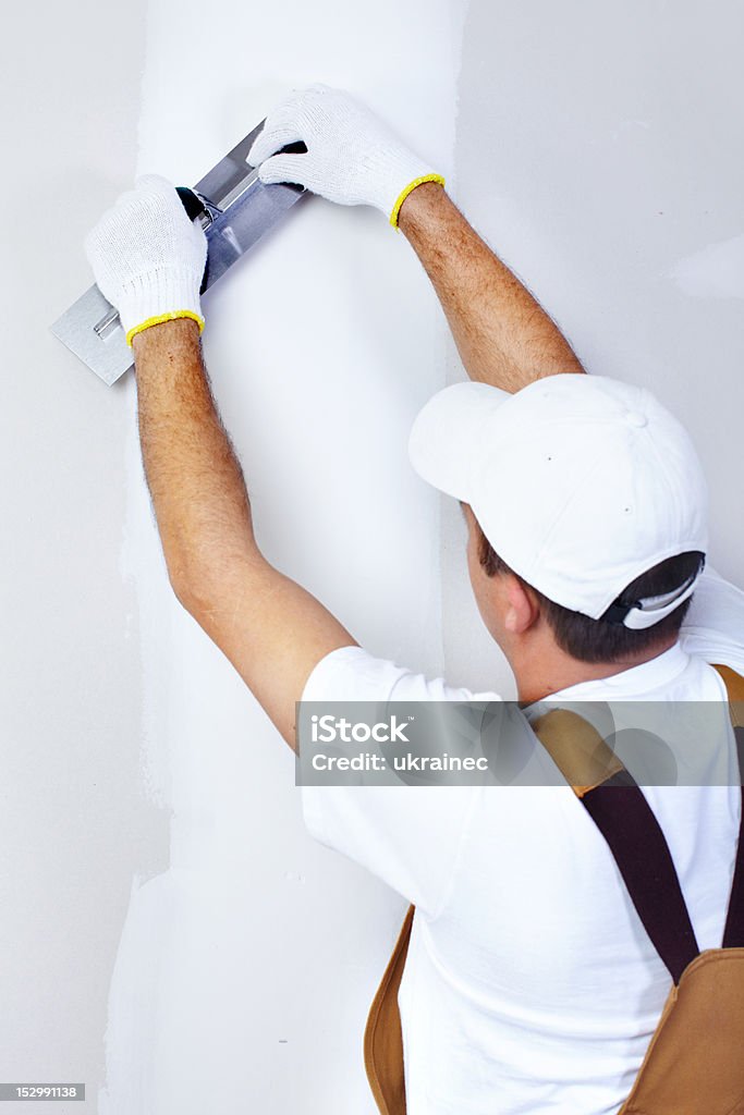 Empreiteira Plasterer - Foto de stock de Adulto royalty-free