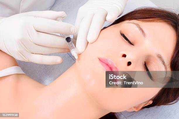 Woman Receiving An Injection Of Botox From A Doctor Stock Photo - Download Image Now
