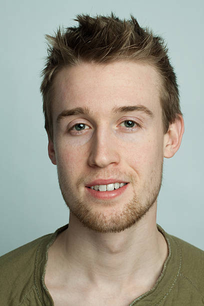 Portrait of a young man smiling stock photo