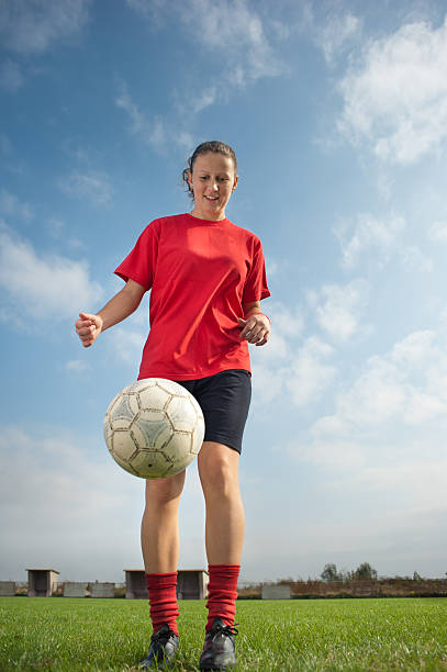 istock women kicking ball 152992641