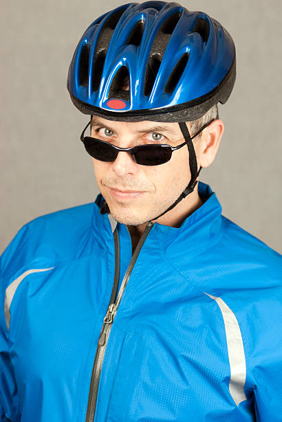 istock Cyclist Looks To Camera 152993098