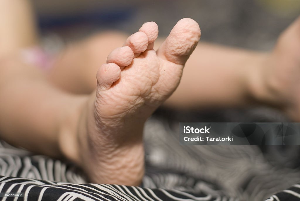 Wrinkled toes Toes wrinkled after bath of a child Wrinkled Stock Photo