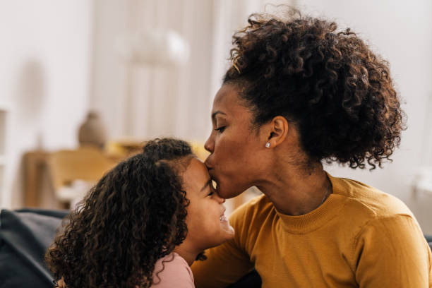 istock mother and daughter at home 1529936938