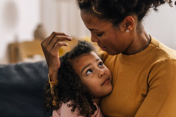 istock mother and daughter at home 1529936939