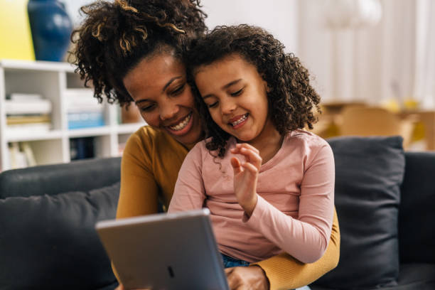 istock mother and daughter at home 1529936940