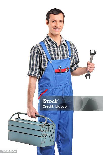 Repairman In Overall Holding A Toolbox And Wrench Stock Photo - Download Image Now - Repairperson - Occupation, White Background, Cut Out