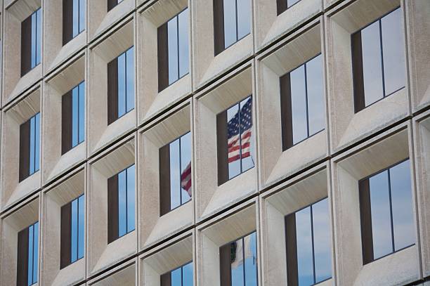 istock American Flag Reflected in Business Building 152995540