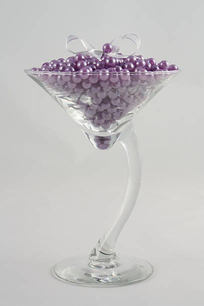 istock Purple pearls in martini glass for decorating purpose 152996813
