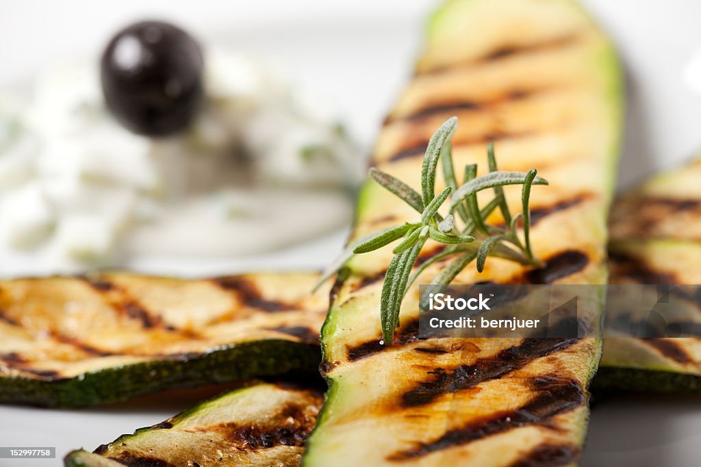 zucchini grilled zucchini with a rosemary leaf Pickle Stock Photo