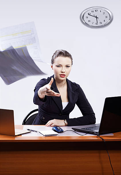 istock businesswoman with two laptops 152997991