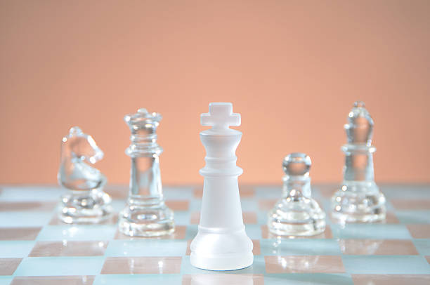 Glass chess figures stock photo