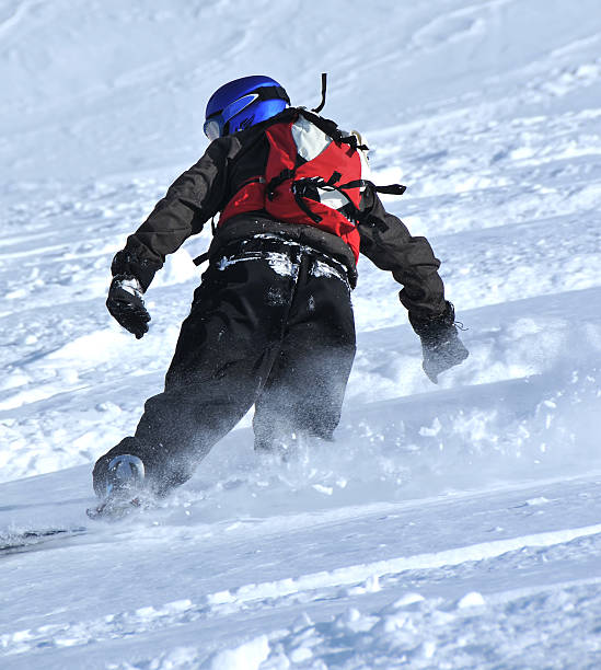 istock snowboarder in powder snow 152998646