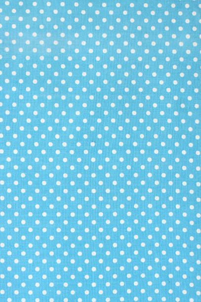 istock A blue piece of fabric with white polka dots 152998937