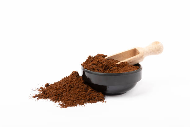 istock Ground coffee and coffee beans isolated on white background. 1529990969