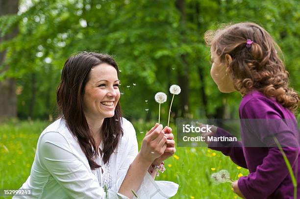 Happy Life Time Mother With Child Stock Photo - Download Image Now - Activity, Adult, Blowing