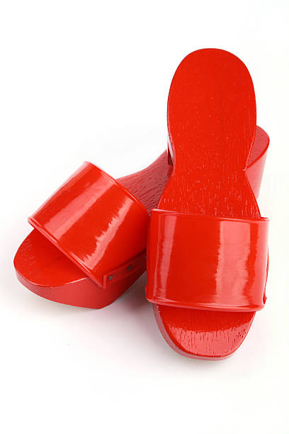 Red wooden clogs stock photo