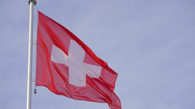 Switzerland flag with blue sky