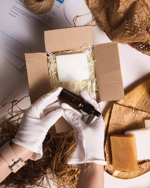 istock Beauty box with serum bottles on shredded white paper 1530007809