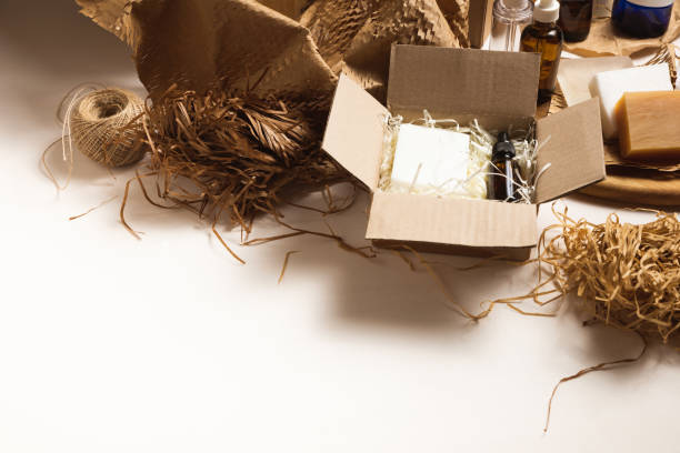 istock Beauty box with serum bottles on shredded white paper 1530007900