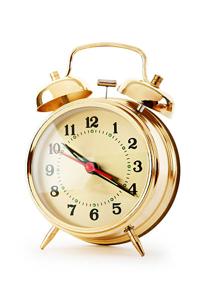 istock Time concept - alarm clock isolated on the white 153001080