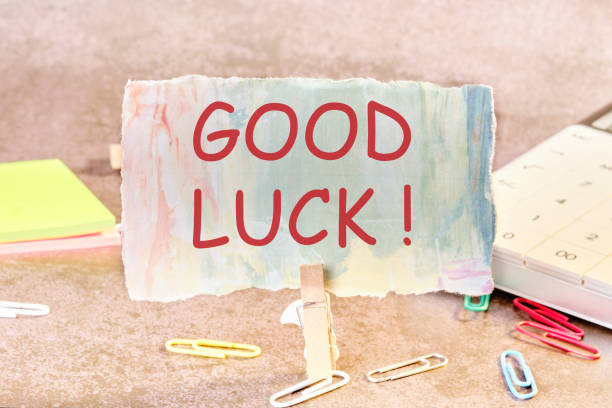 istock A note on paper with good luck wishes on the table secured with a clothespin 1530011343