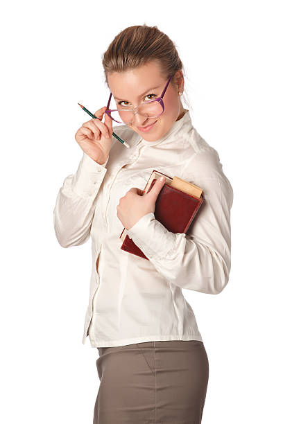 istock strict teacher with book and pen 153001498