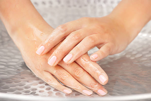 Woman's hands humidification stock photo