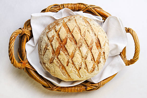 Rustic bread in bakery basket stock photo