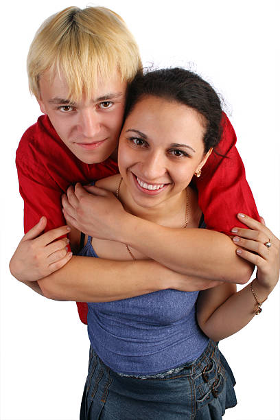 Young couple embraces top view stock photo