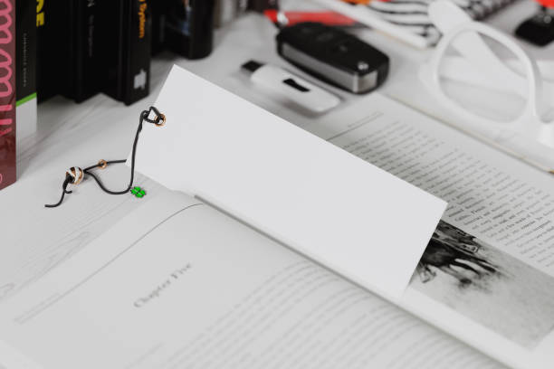 istock Bookmark with a decorated lace in a book mockup. 3D rendering 1530019622