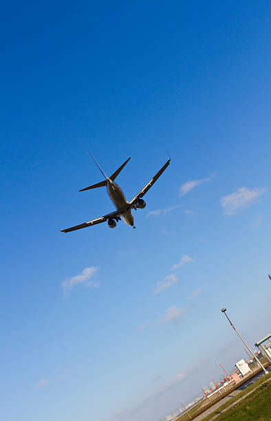 istock airplane with sunflare 153002666