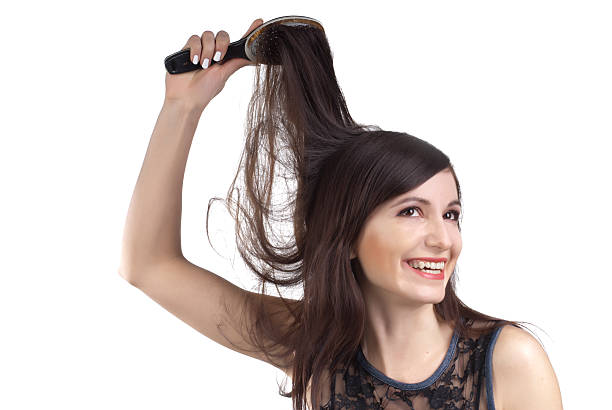 istock Combing of hair 153003901