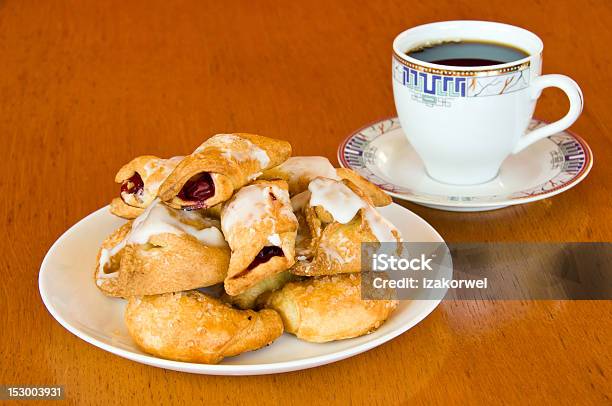 Pastry And A Cup Of Coffee On Wooden Table Stock Photo - Download Image Now - Baked, Baked Pastry Item, Breakfast