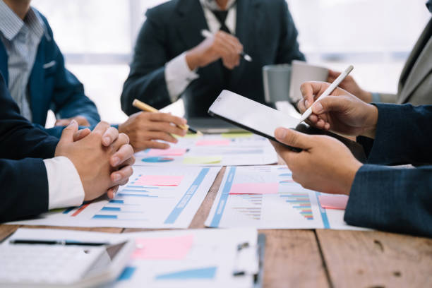 istock business team discuss with new startup project Idea presentation, analyze planning and financial statistics and investment market at office. 1530043771